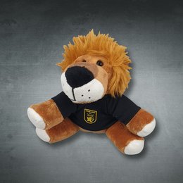 Brauner Plüsch-Löwe als Werbeartikel mit schwarzem Shirt und Transferdruck-Logo der Tölzer Löwen auf grauem Hintergrund.
