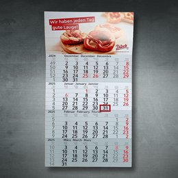 Wrbe-Wandkalender mit 4 Monatsübersicht und Foto von Laugengebäck oben im Kopfbereich